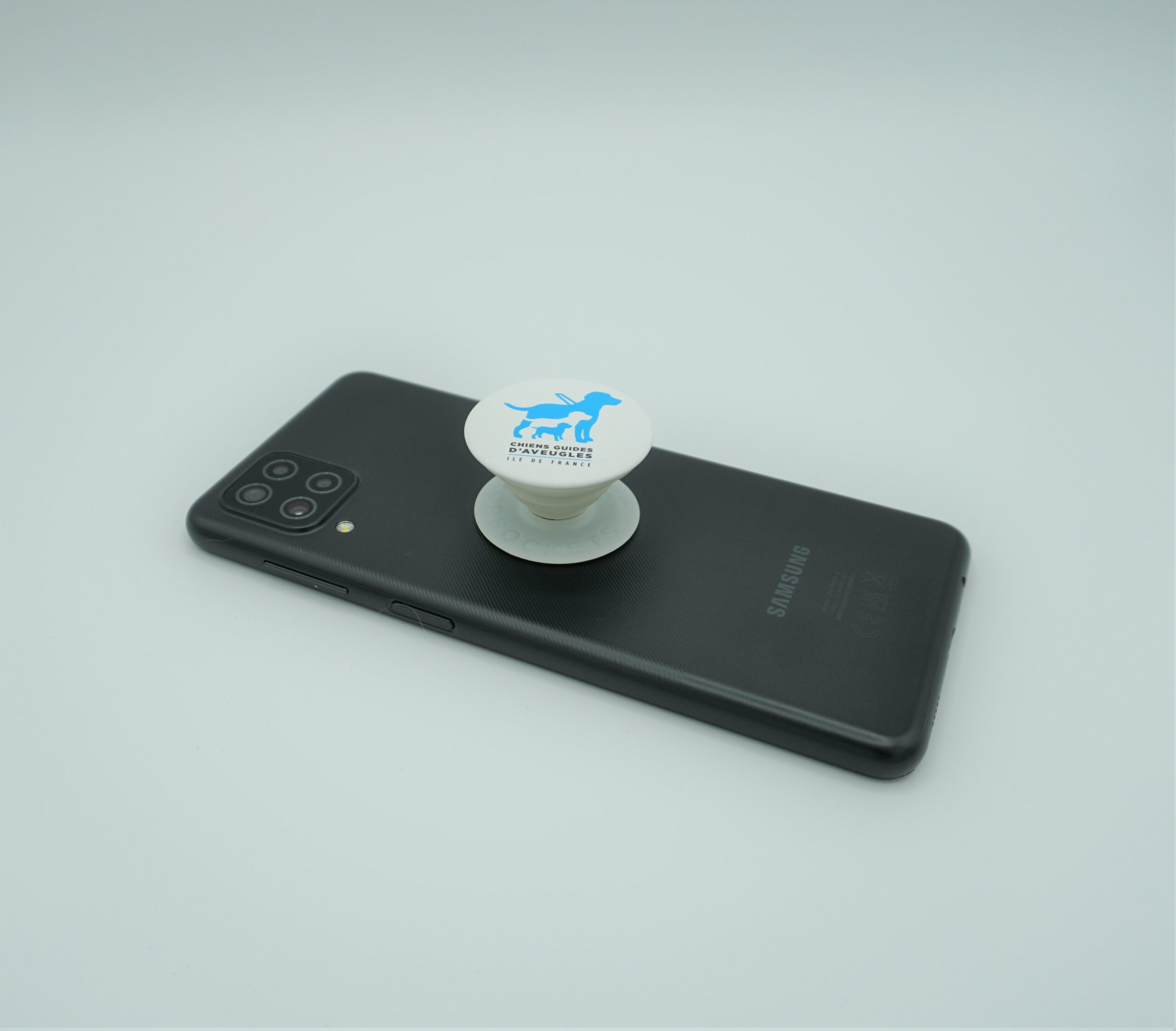 Popsocket De Téléphone Collé Sur Un Téléphone Portable